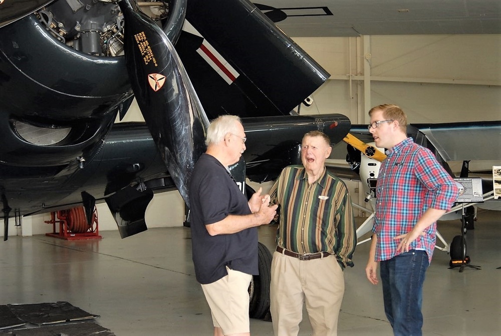 Museum volunteers tour aviation museum