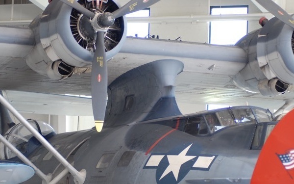 Naval Museum's volunteers descend on aviation museum