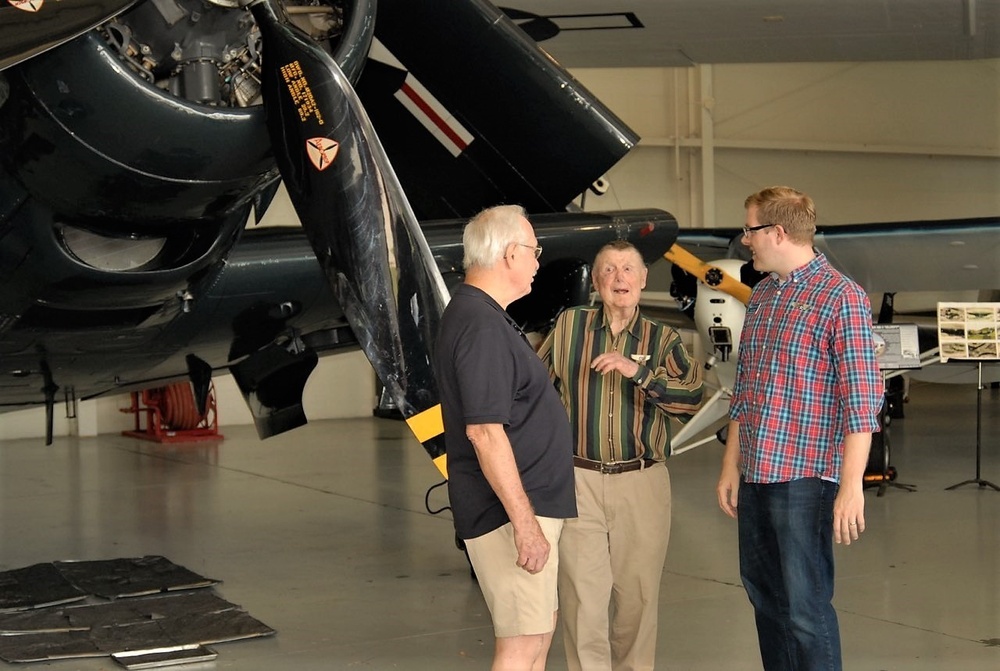 Veterans in-front of an airworthy AD-4 Skyraider