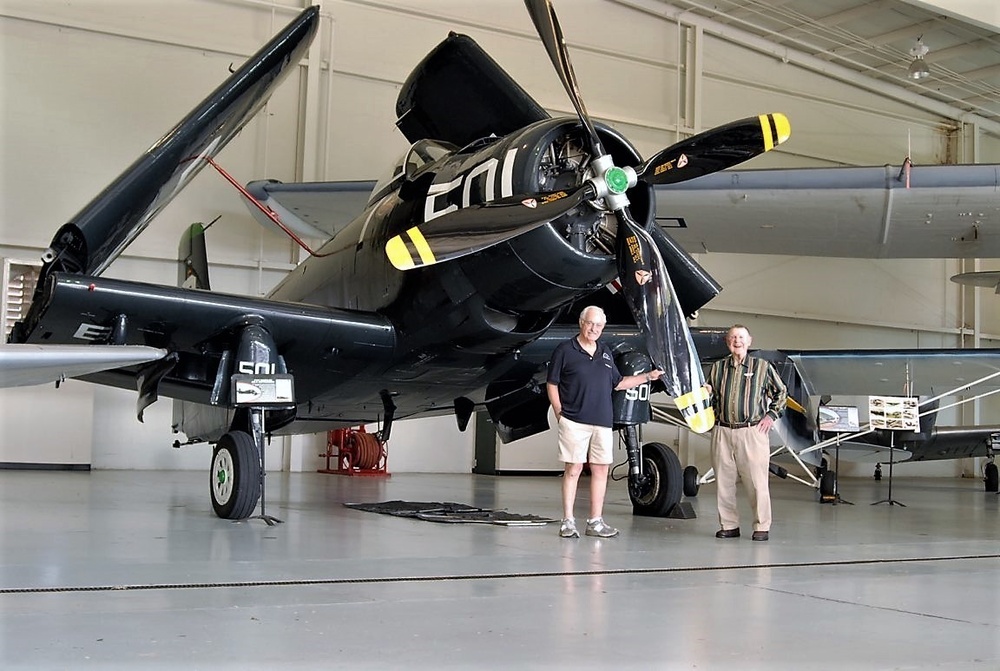 Veterans in front of an airworthy AD-4 Skyraider