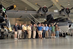 Museum volunteers descend on aviation museum for a tour