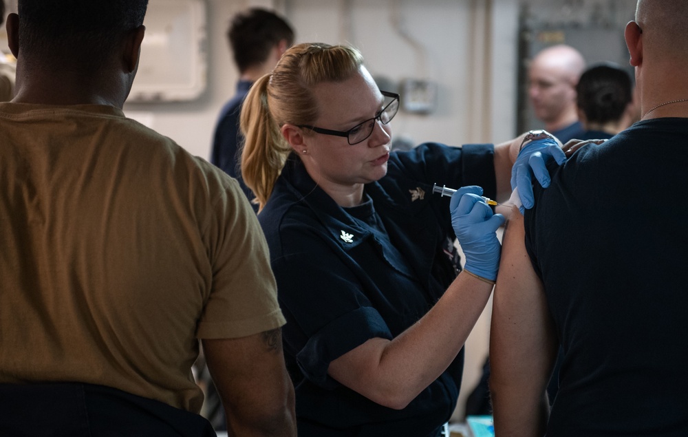 Seasonal flu vaccinations aboard USS John C. Stennis