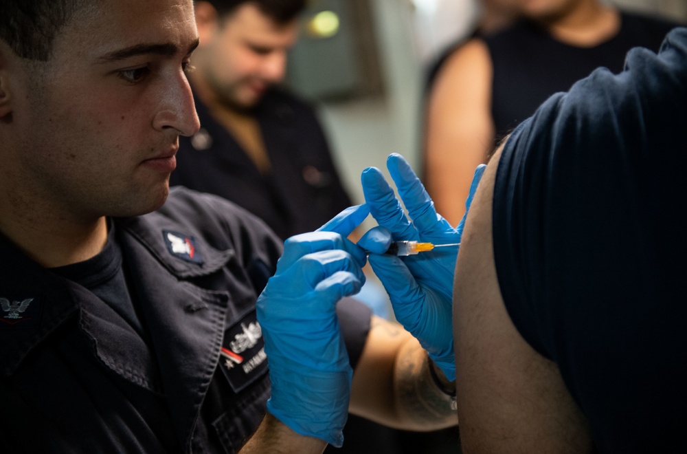 Seasonal flu vaccinations aboard USS John C. Stennis