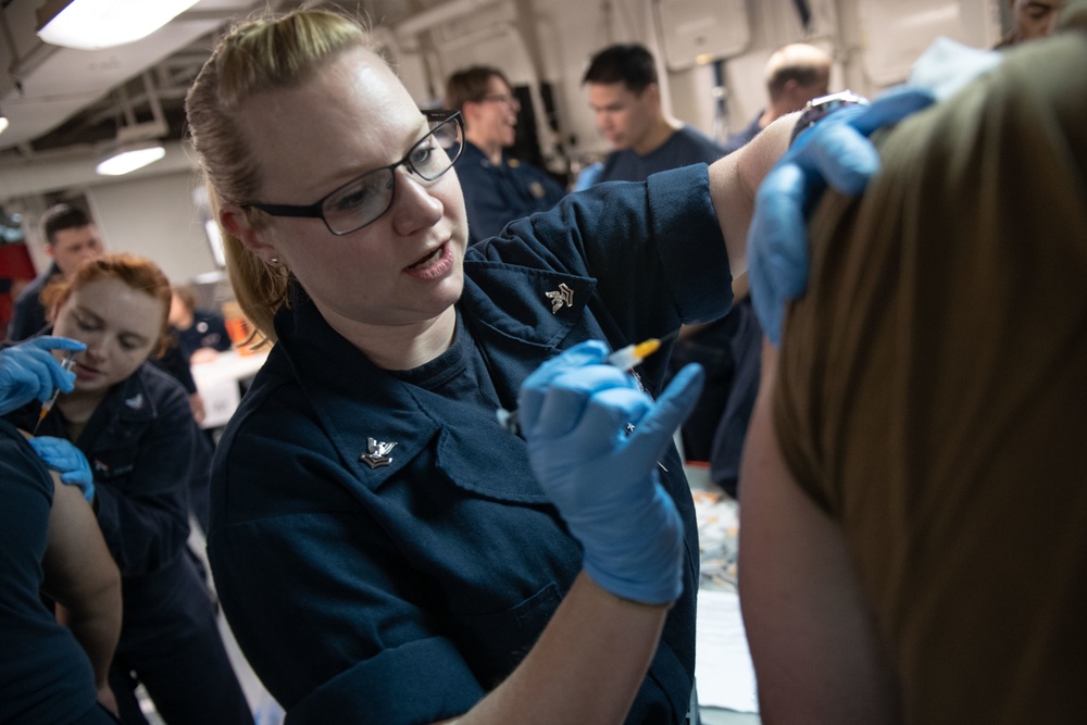 Seasonal flu vaccinations aboard USS John C. Stennis