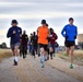 Airmen brave cold weather during half marathon