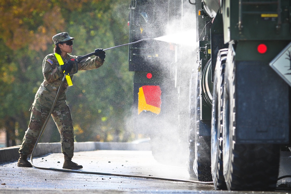 Working' At The Car Wash: Soldiers Prepare Vehicles For International Travel