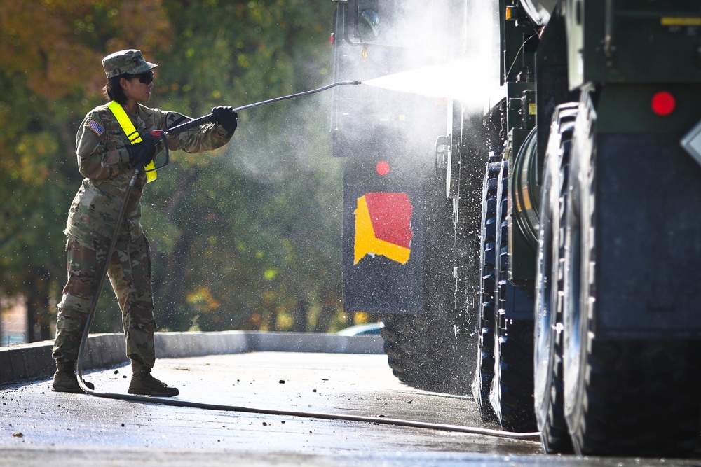 Workin' At The Car Wash: Soldiers Prep Vehicles For International Travel