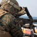 Weapons Company Marines fire machine guns aboard the Wasp