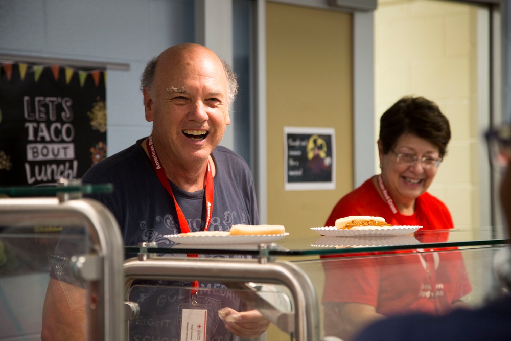 Merican Red Cross serves hot meals to disaster survivors in Panama City Beach, FL