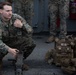 Weapons Company Marines fire machine guns aboard the Wasp