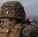 Weapons Company Marines fire machine guns aboard the Wasp