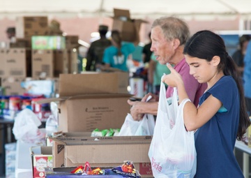 Volunteers mobilized to help with relief efforts at a point of distribution site in Panama City Beach
