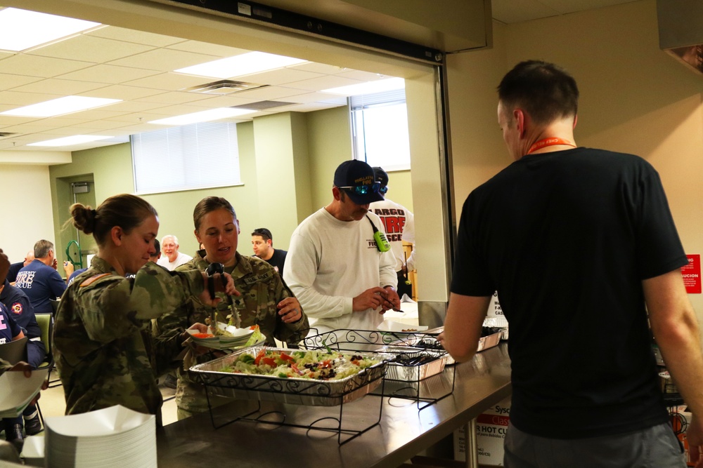 Whirling together: Guardsmen and volunteers provide for the community