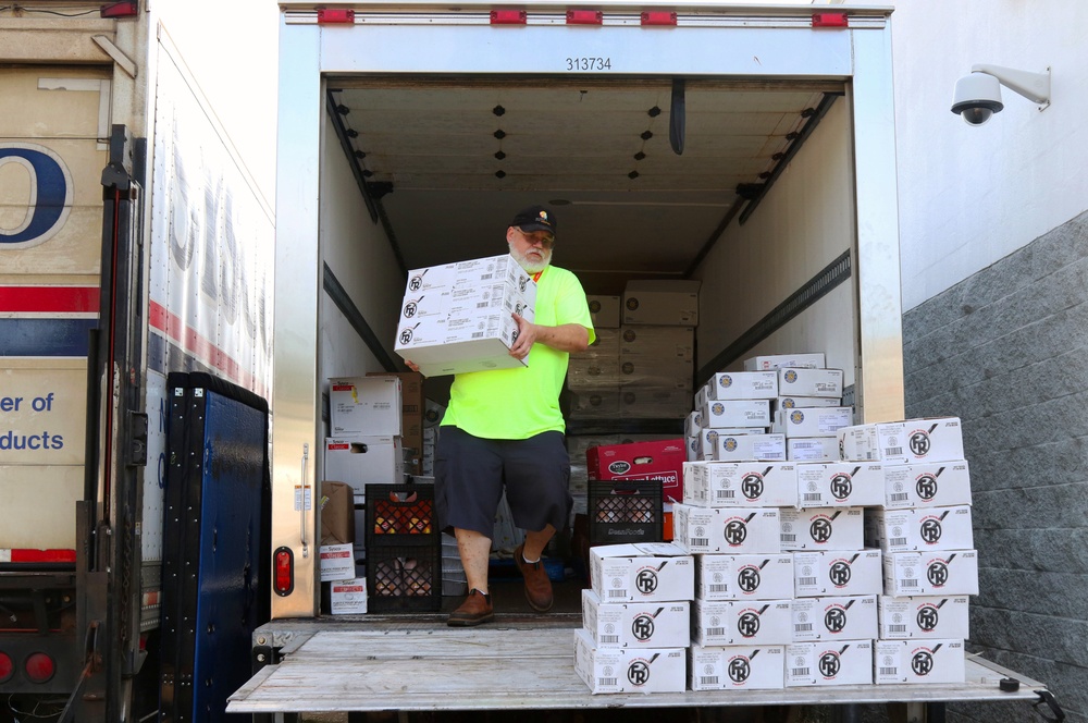 Whirling together: Guardsmen and volunteers provide for the community