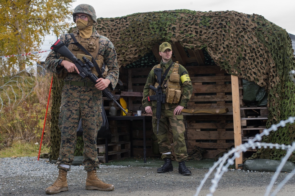 U.S. Marines and Norwegian Soldiers Guard an Entry Control Point in Hell, Norway