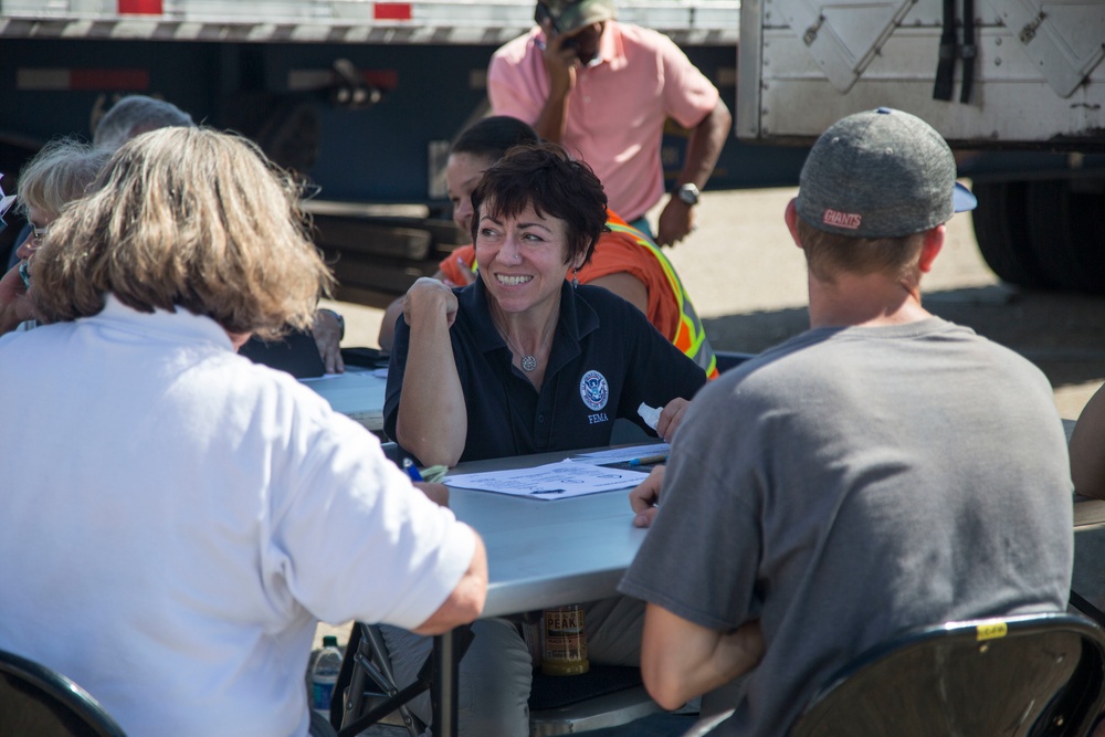 Hurricane survivors register for disaster assistance with FEMA DSA Teams