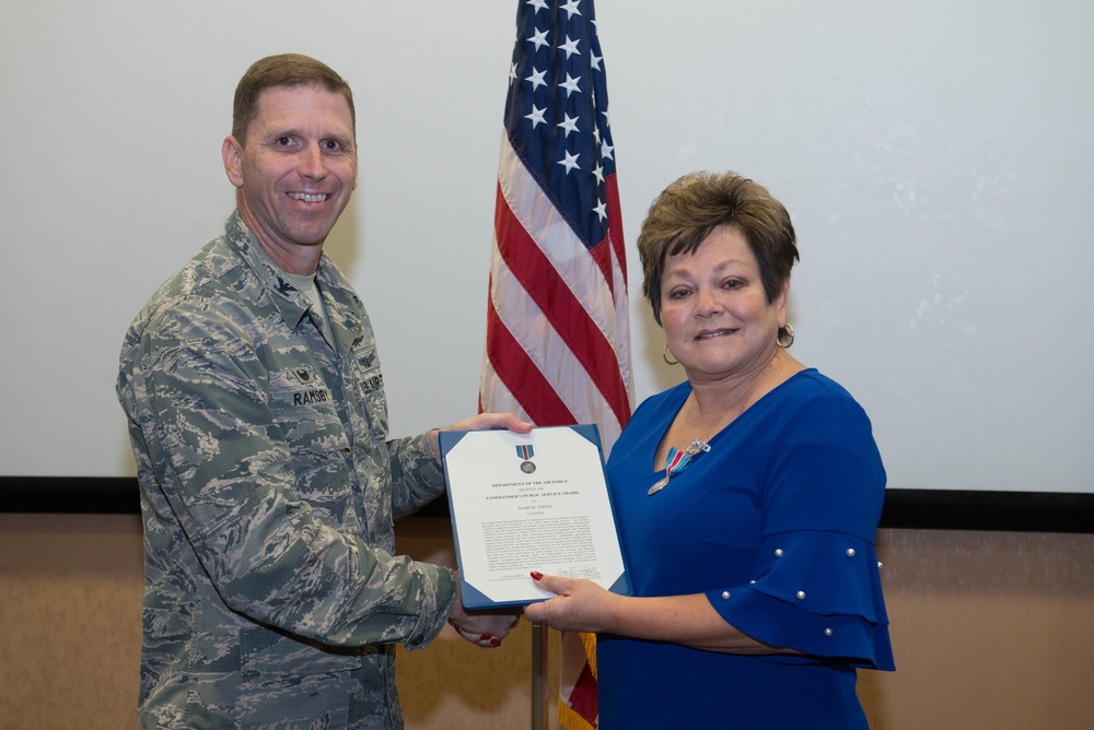 55th Communications Squadron Honorary commander receives award