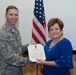 55th Communications Squadron Honorary commander receives award