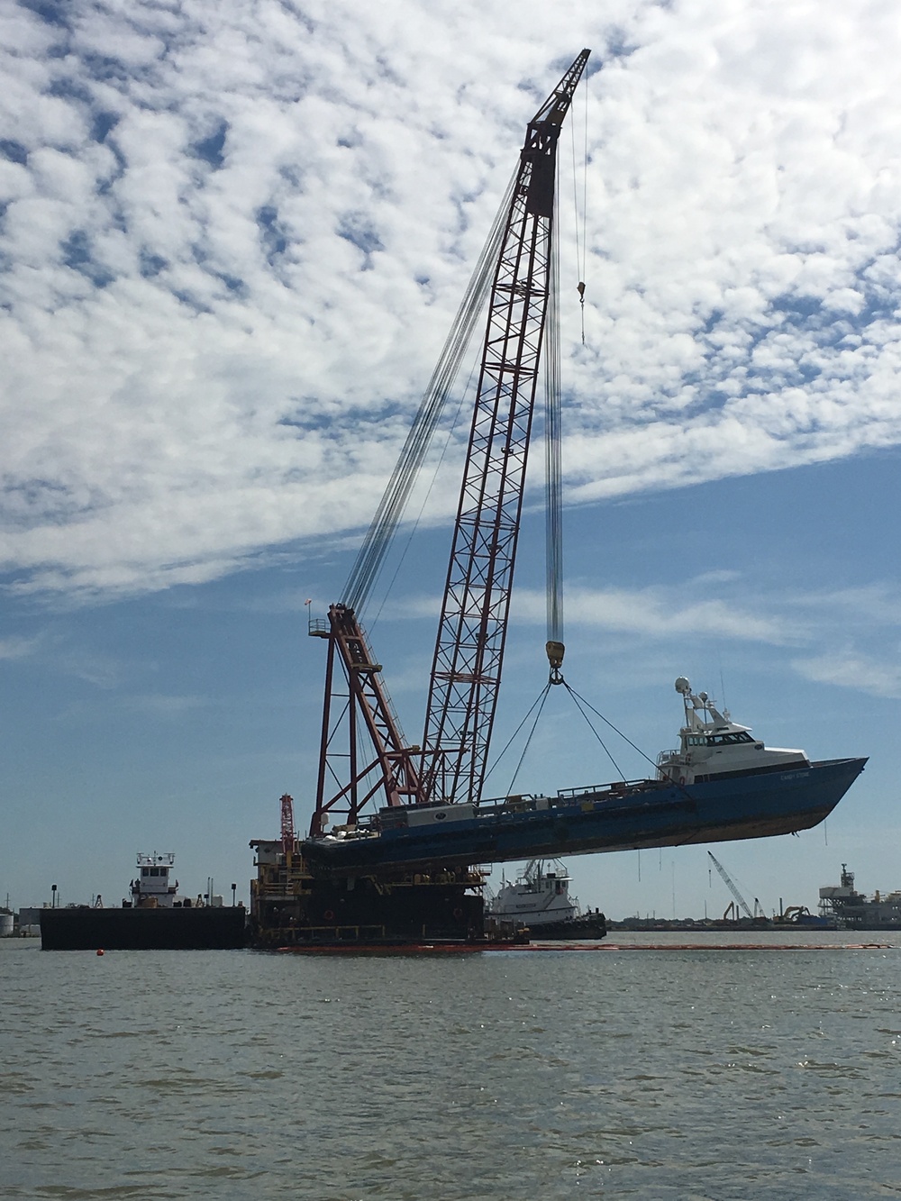 Coast Guard oversees lift operation of damaged vessel near Cameron, Louisiana