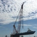 Coast Guard oversees lift operation of damaged vessel near Cameron, Louisiana
