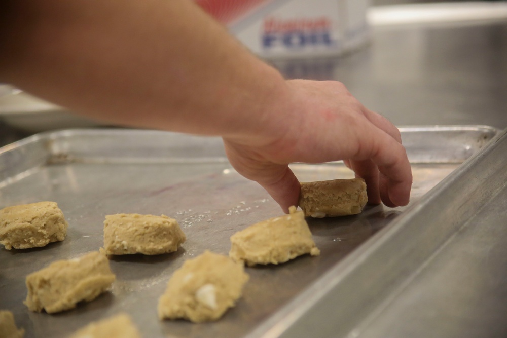 Food Service Marines aboard the USS Wasp serve food