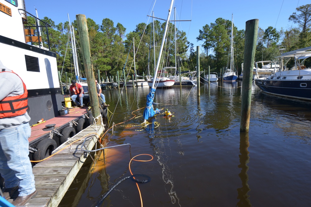 Federal and State agencies work with Resolve Marine Group to conduct boat lift operations