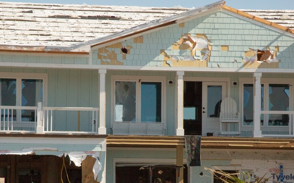 Urban search and rescue crews in Mexico Beach, siftis through debris of what used to be homes and businesses
