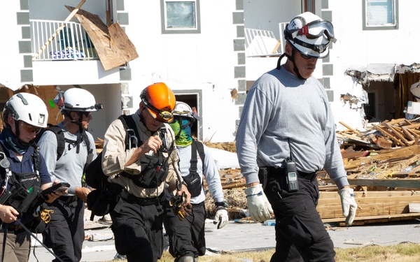 Urban search and rescue crews in Mexico Beach sifts through debris of what used to be homes and businesses
