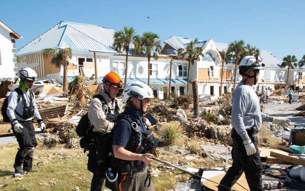 Urban search and rescue crews in Mexico Beach sifts through debris of what used to be homes and businesses