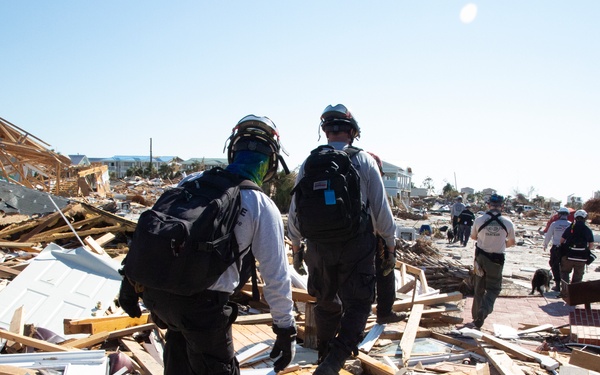 Urban search and rescue crews in Mexico Beach sifts through debris of what used to be homes and businesses