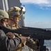 Marines Coach Sailors on pistol marksmanship and machine gunnery