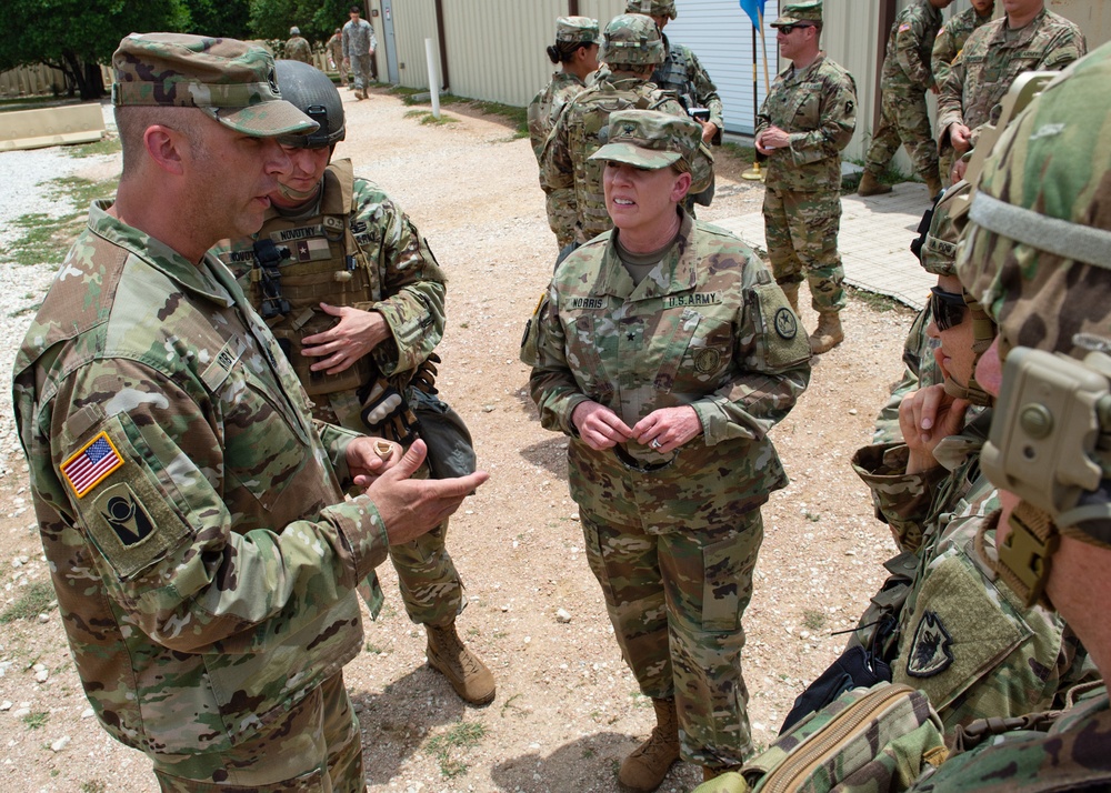 Brigadier General Tracy Norris, Dep. Adjutanat General TXARNG, visits troops at Camp Bullis, TX