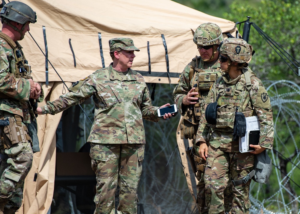 Brigadier General Tracy Norris, Dep. Adjutanat General TXARNG, visits troops at Camp Bullis, TX