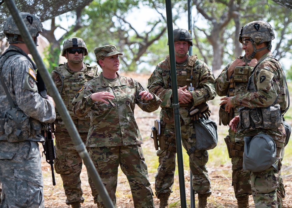 Brigadier General Tracy Norris, Dep. Adjutanat General TXARNG, visits troops at Camp Bullis, TX