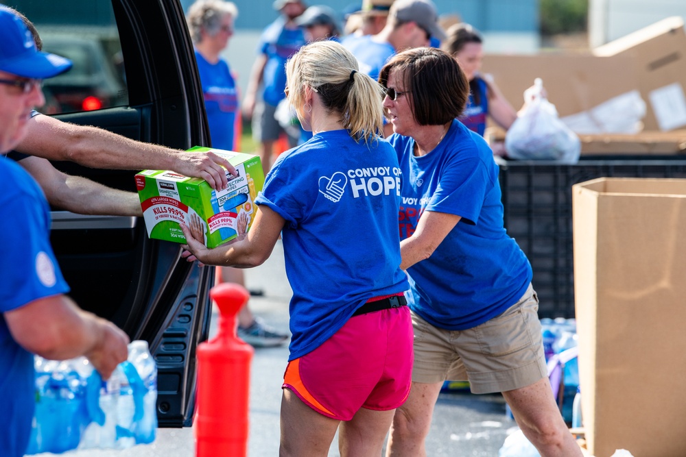 NGOs Help Distribute Supplies To Hurricane Michael Survivor