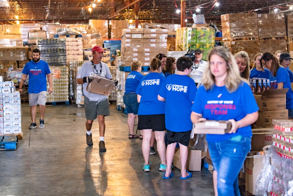 NGOs Help Distribute Supplies To Hurricane Michael Survivor