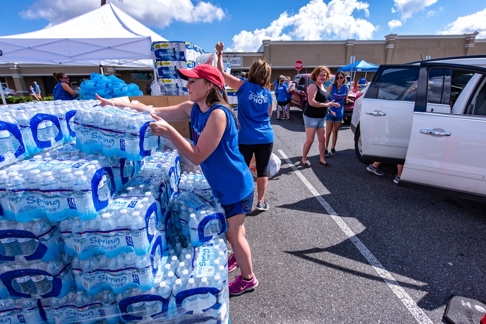 NGOs Help Distribute Supplies To Hurricane Michael Survivor