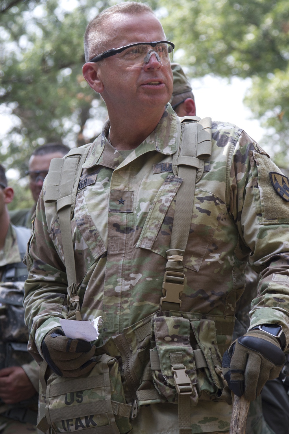 Brigadier Gen. Vincent B. Barker, deputy commanding general, 377th Theater Sustainment Command, speaks to Soldiers participating in the Combat Support Training Exercise at Fort McCoy