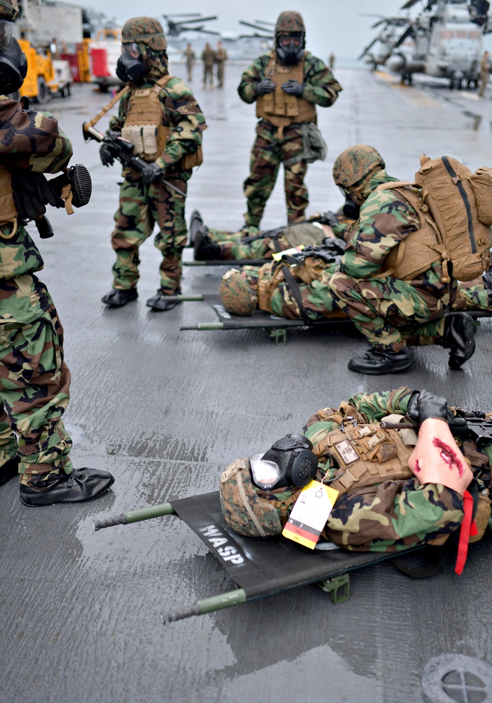 Mass casualty drill in a CBRN environment aboard USS Wasp
