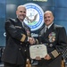Navy Capt. Brian Ginnane receives medal