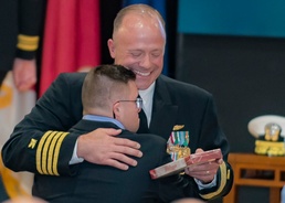Navy Capt. Brian Ginnane and son