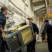 Sailors Carry Ice Maker