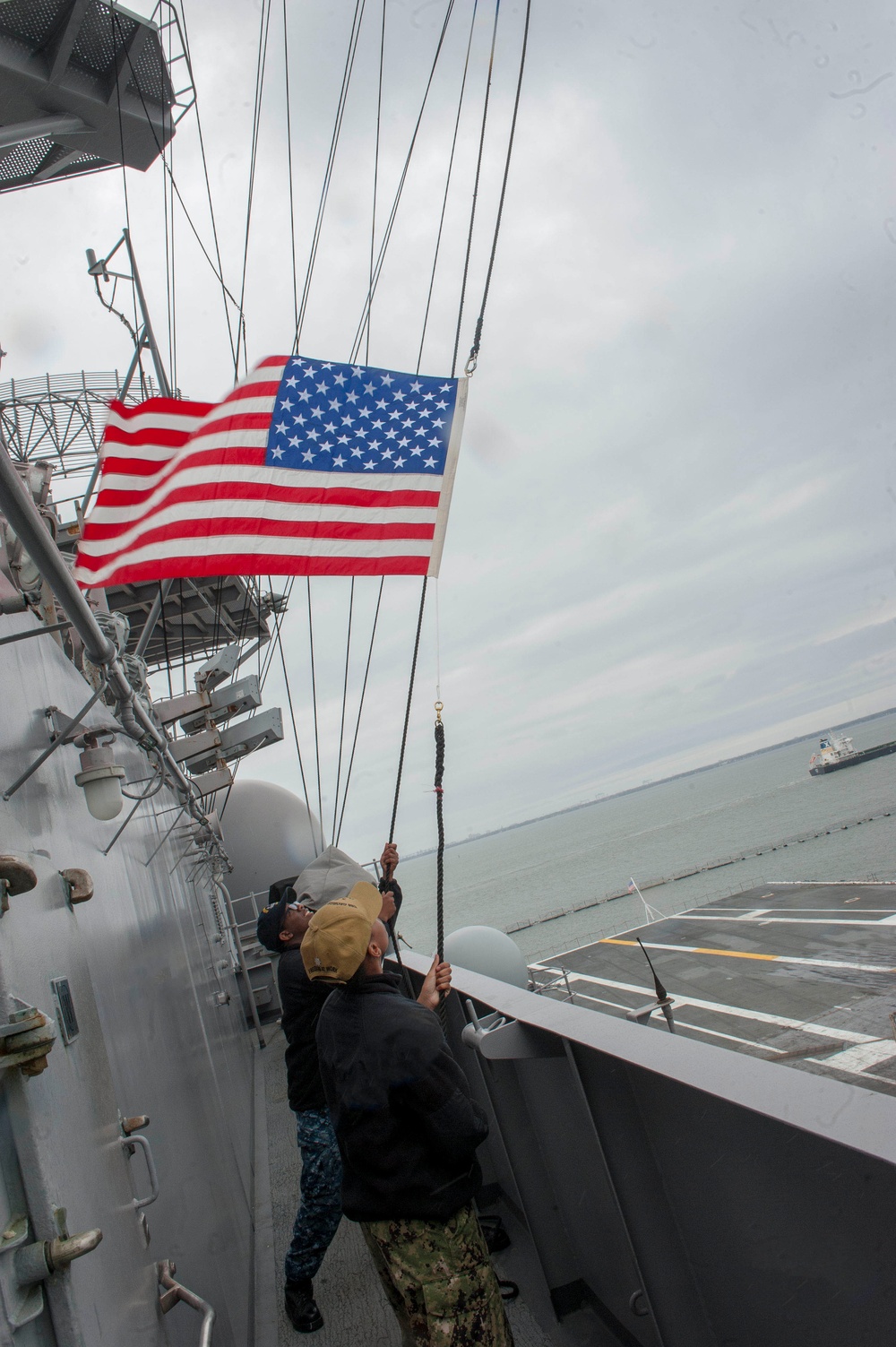 Sailors Raise the Ensign