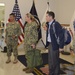 DLA Aviation Industrial Support Activities commanders listen as Linda Farrell, DLA Troop Support’s Flag Room supervisor, welcomes the visitors with a brief history of DLA’s hand embroidery specialists in Philadelphia Oct. 18, 2018.