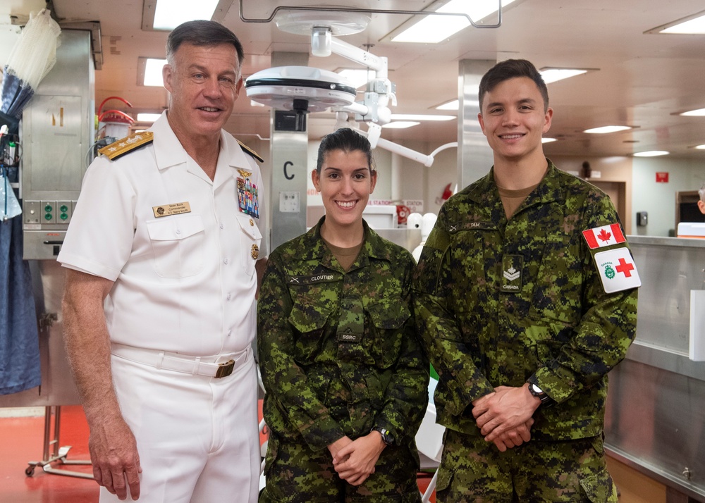 Rear Adm. Buck Meets Partner Nation Personnel During a Distinguished Visitors Tour Aboard the USNS Comfort