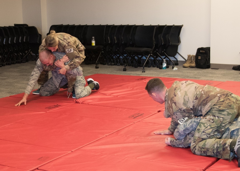 102nd Security Forces Squadron participate in Combatives Training
