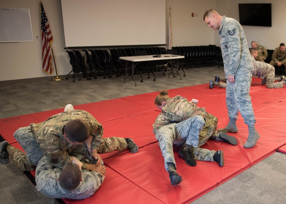 102nd Security Forces Squadron Airmen participate in Combatives Training