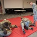 102nd Security Forces Squadron Airmen participate in Combatives Training