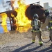 99th CES, local fire department battle simulated aircraft fire