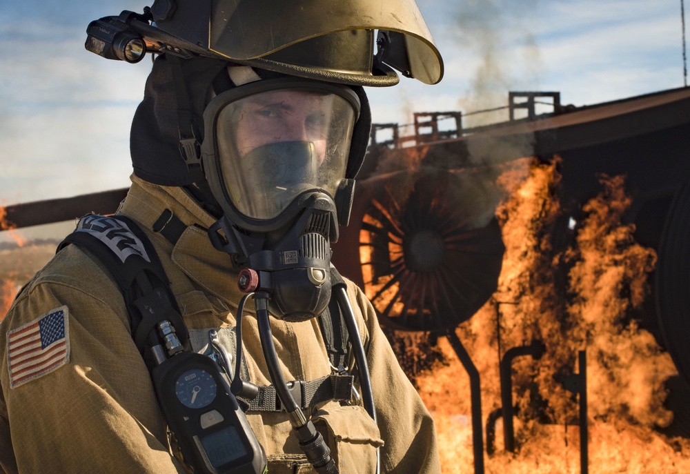 99th CES, local fire department battle simulated aircraft fire